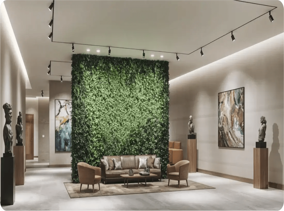 Elegant modern interior design with green wall and statues