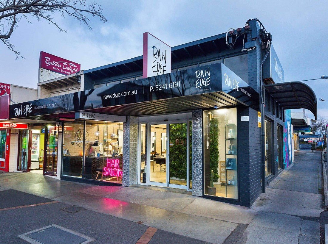 A Salon Client Benefits from Artificial Green Walls by Designer Plants