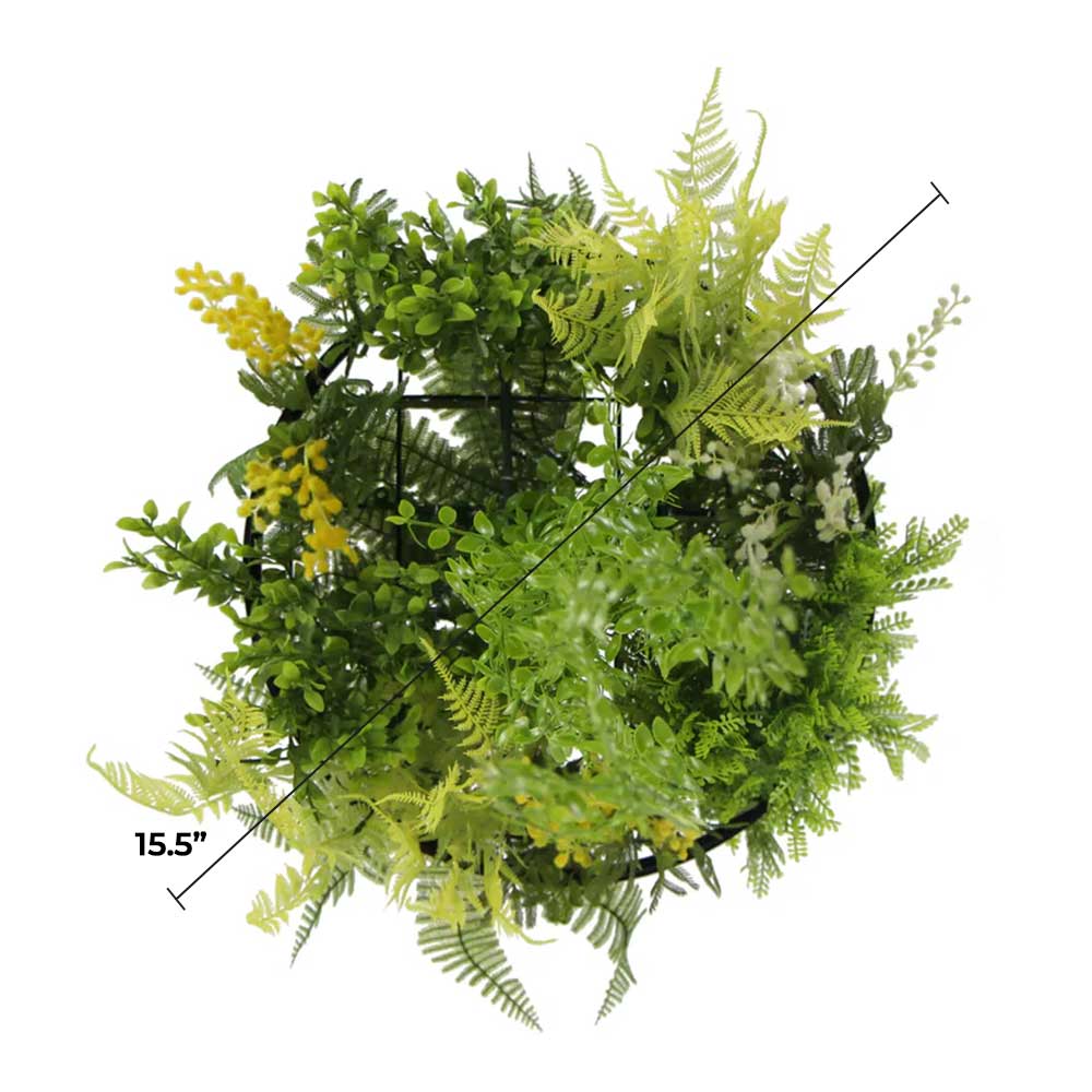 Faux greenery on a 15.5" black hanging disc.