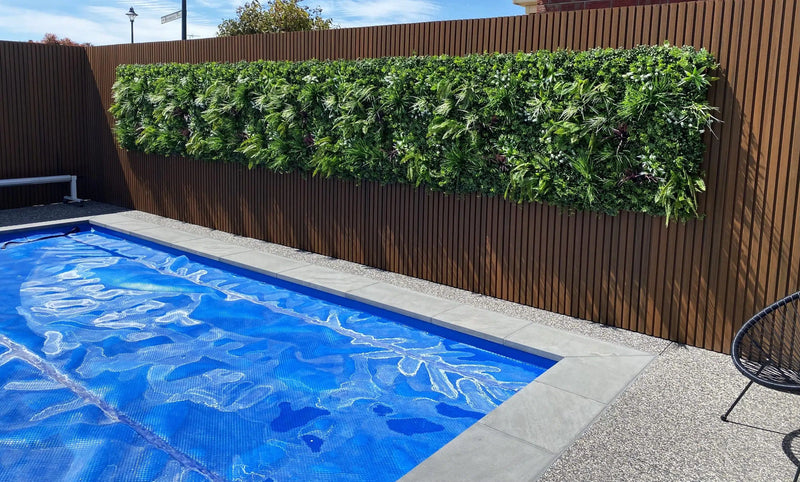 Premium Artificial Vertical Garden Panel Vista Green Installed Around a Pool