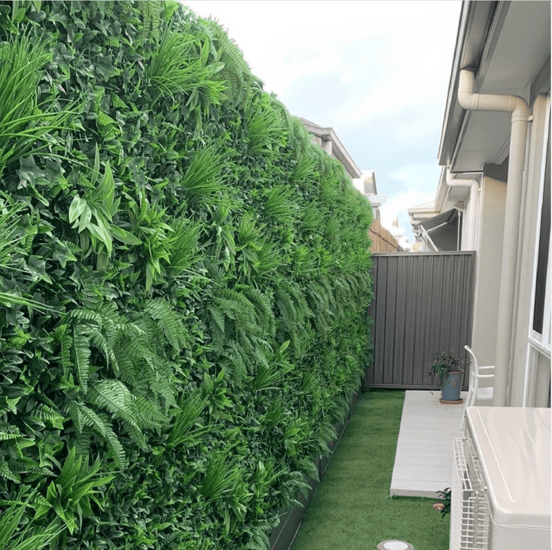 Side fence with artificial vertical garden panels