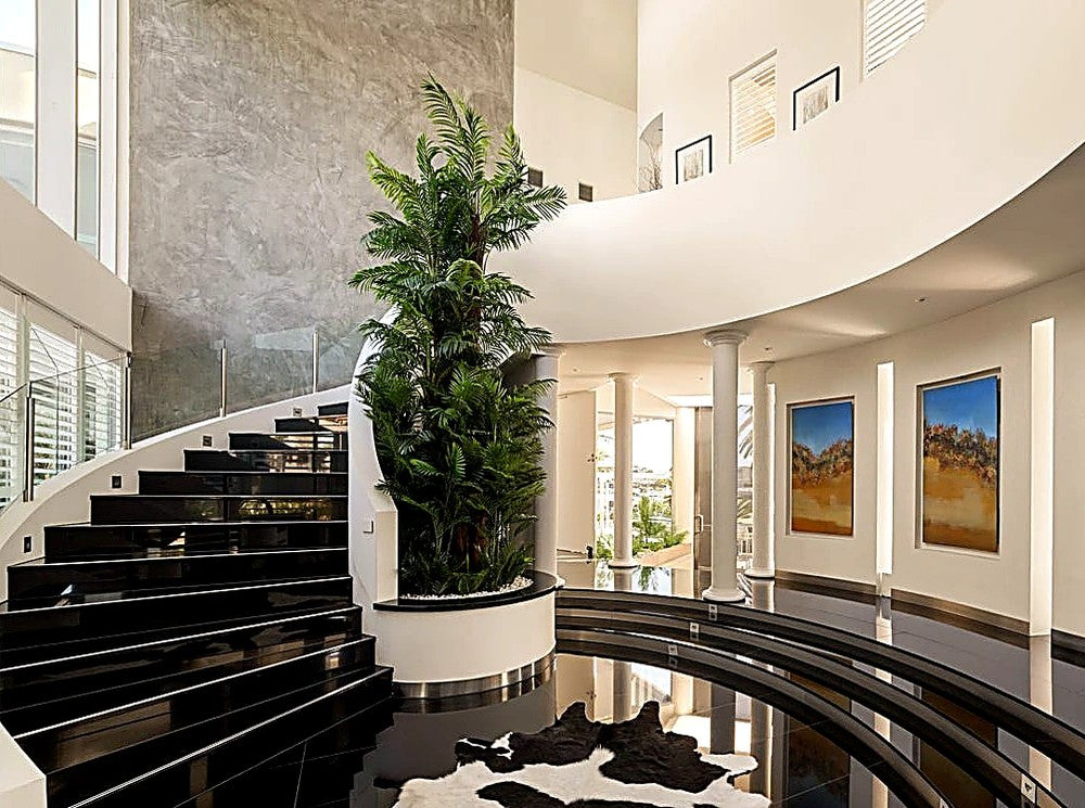 Luxury Home Transformation: How Designer Plants Created a Tropical World in Artificial Palms and Plants