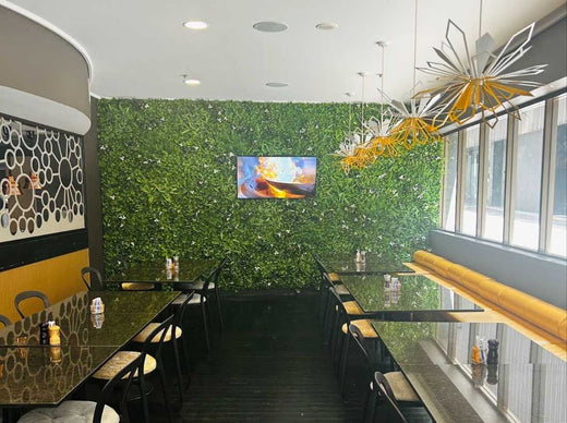 faux green wall Occor restaurant