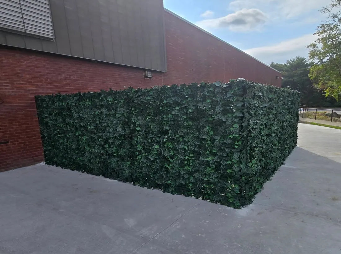 Outdoor faux green wall covering ac unit