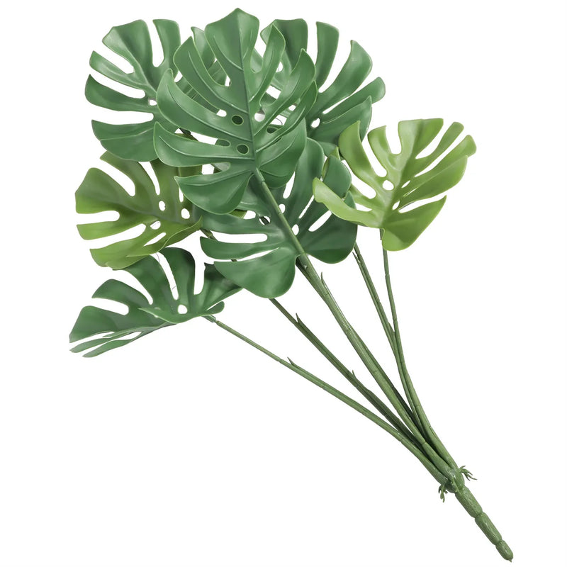 Weather-resistant synthetic split leaf philodendron, ideal for creating a serene green space