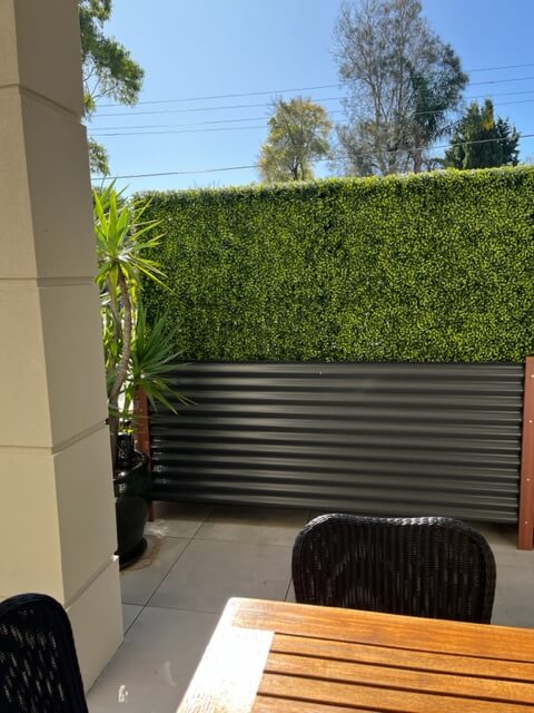 Large Artificial Boxwood Hedge for Privacy Screening With Planters Made of Timber and Metal