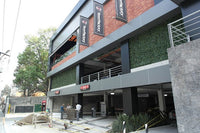Artificial Laurel Hedge Panels on a Commercial Car Park