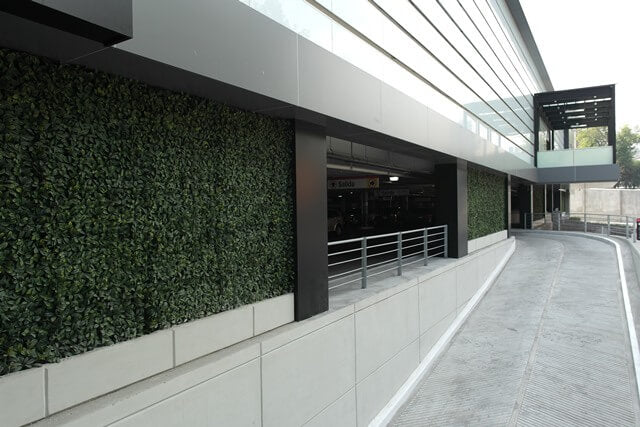 Artificial Laurel Hedge Panels on a Commercial Car Park Privacy Screen