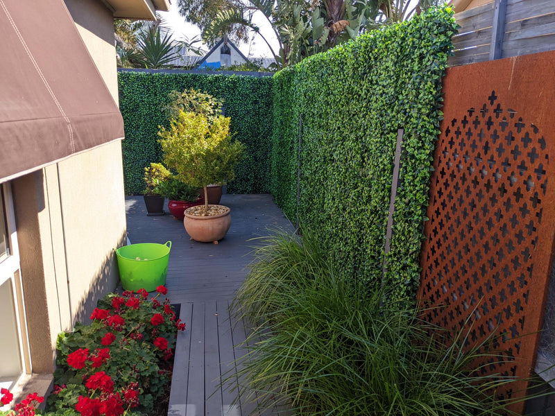Outside Area Enhance with a Faux Plant Wall Garden