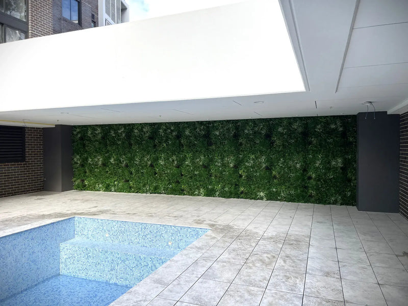 Artificial Vista Wall Panel for a Vertical Garden along a Pool in an Apartment Building