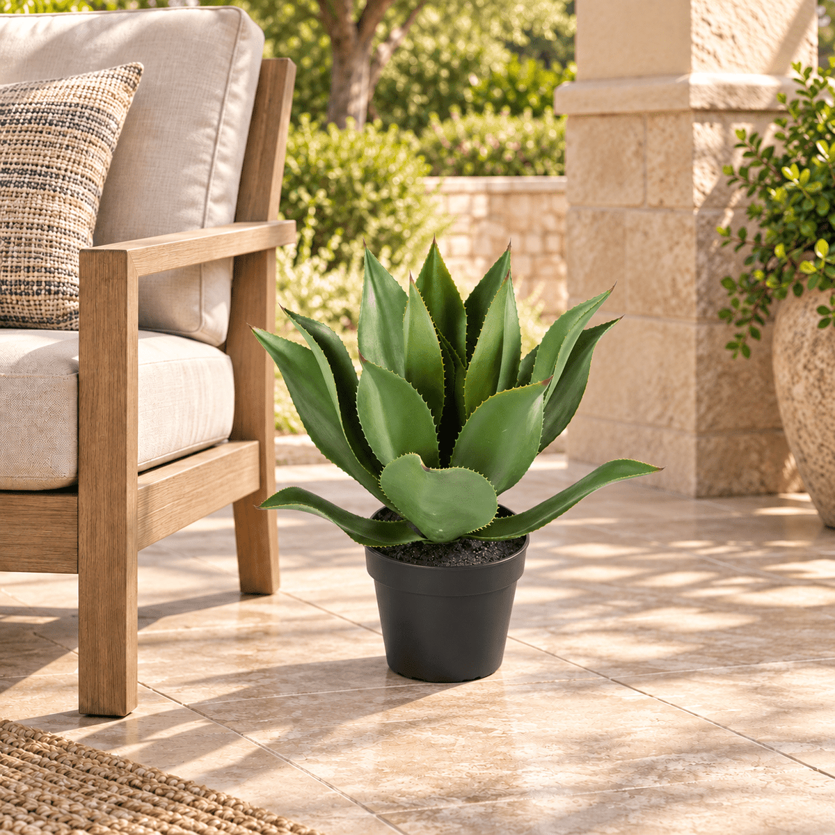 21.7-inch UV-resistant artificial Agave tree in its black nursery pot on a covered outdoor patio