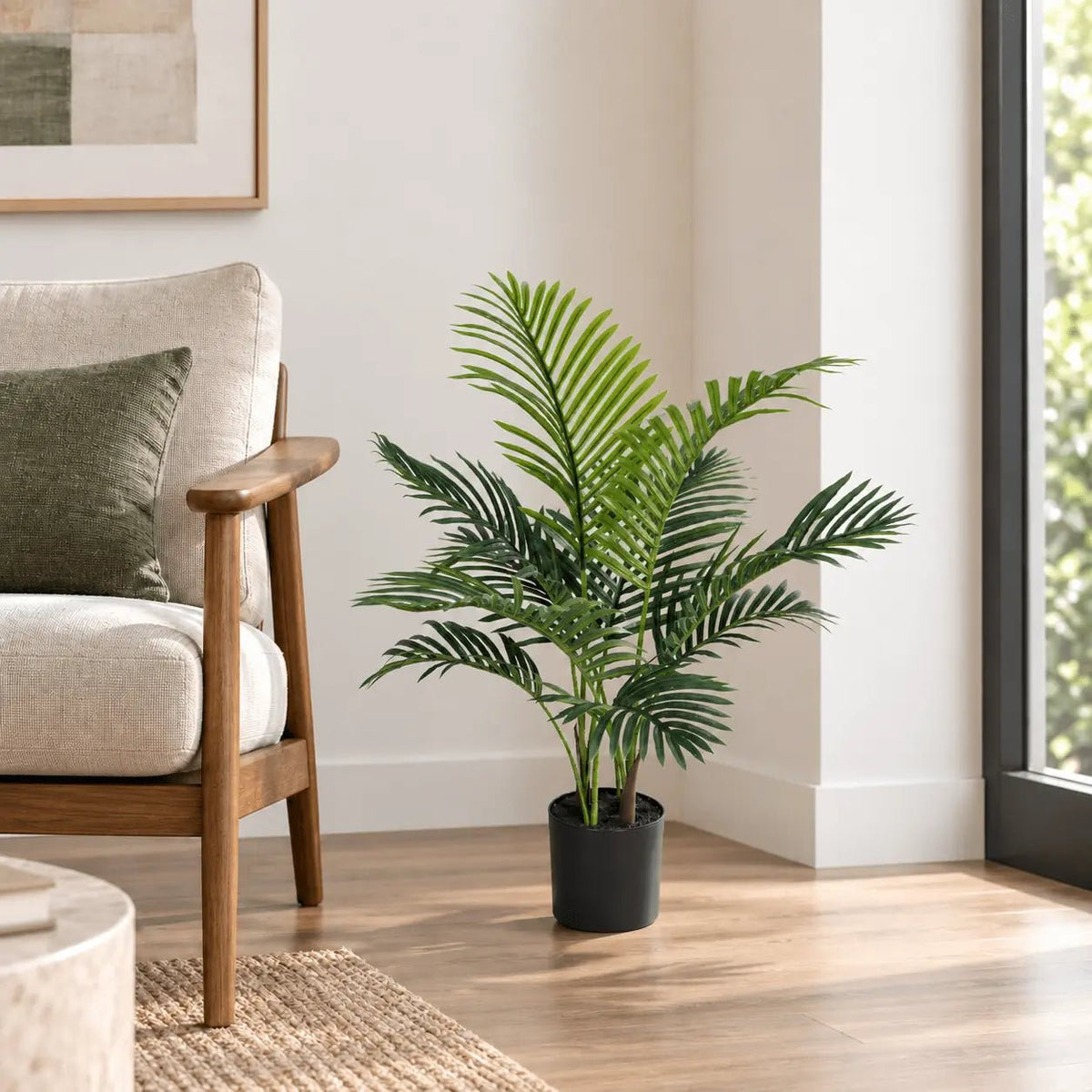 35.4-inch Areca Palm artificial tree in its black nursery pot beside an indoor lounge chair