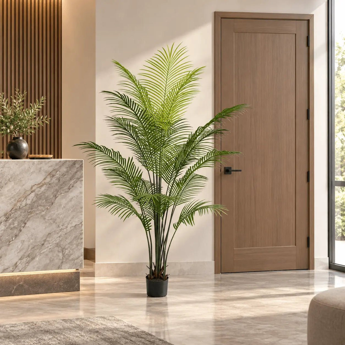 70.9-inch Areca Palm artificial tree in its black nursery pot in an indoor hotel lobby