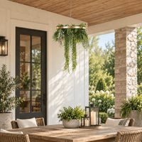 24-inch UV-resistant imitation gold artificial hanging green disc displayed at true scale on a sheltered outdoor dining terrace