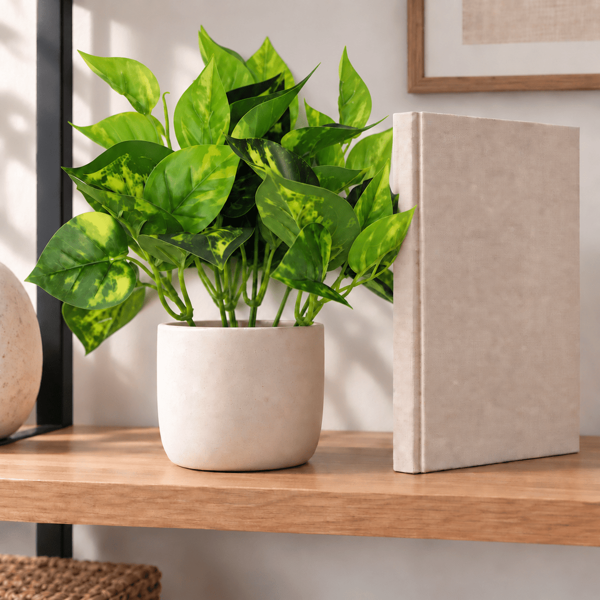 9.5-inch Pothos Devil's Ivy artificial bush in a ceramic pot on an indoor shelf