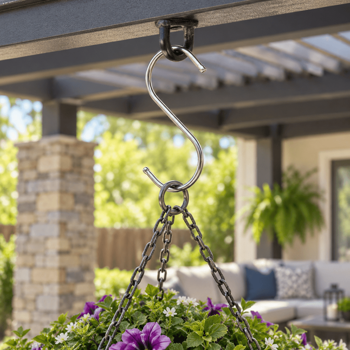 4.72-inch stainless steel S hook supporting an artificial hanging basket on an outdoor pergola