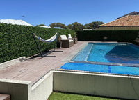 Artificial Mixed Ivy Hedge Panel on a Fence Doral