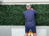 Artificial Vertical Gardens on brick wall